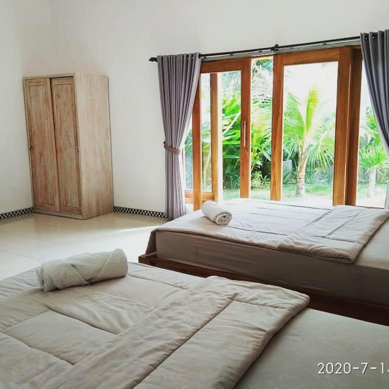 Harris Surf Villa Пулукан Экстерьер фото
